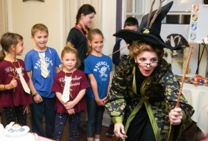 Prof. McG handing out wands
